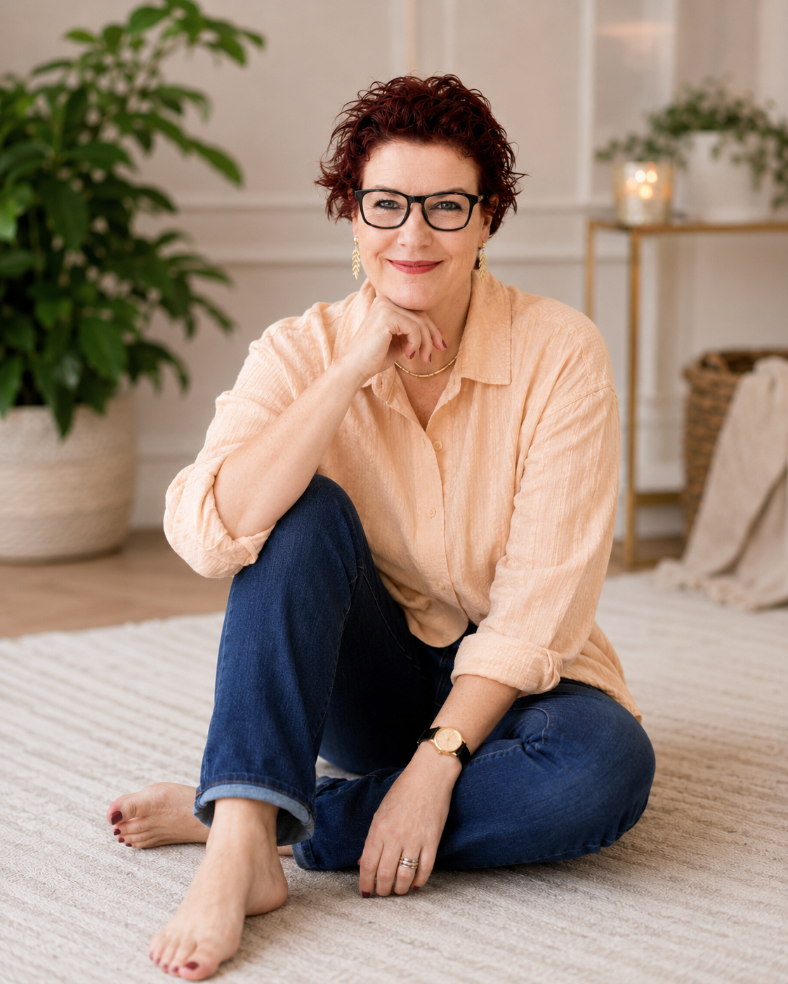 Cindy Liebenberg, founder of Lieben Ladies, seated in warm home studio